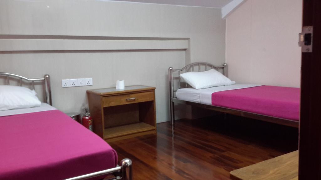 Ocean Pearl Inn - 3 Янгон Номер фото